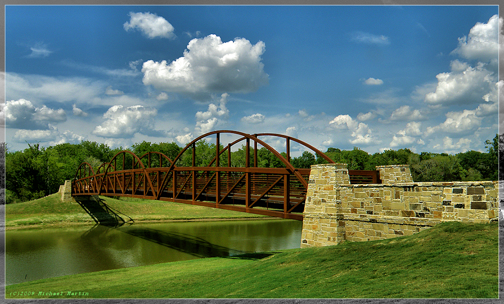 Footbridge over the lake at Bridgeland in Cypress